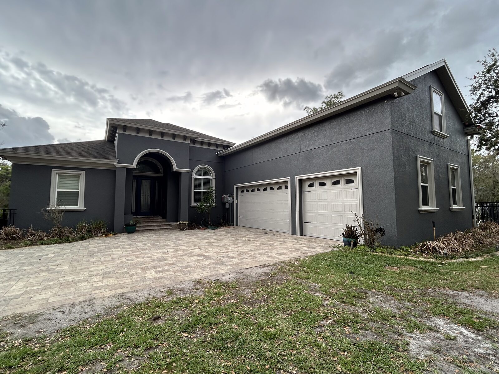 Charcoal-painted home exterior repaint